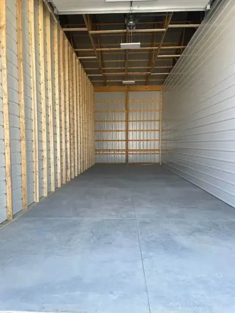 Inside a tall enclosed WEStore Ohio unit with timber framing